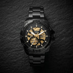 Black Automatic Skeleton Watch for Men – Gold Dial Stainless Steel Bracelet